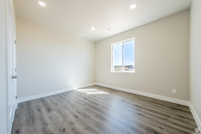 4377 E Colt Cir, Kanab, UT 84741 - empty room with visible vents, recessed lighting, baseboards, and wood finished floors