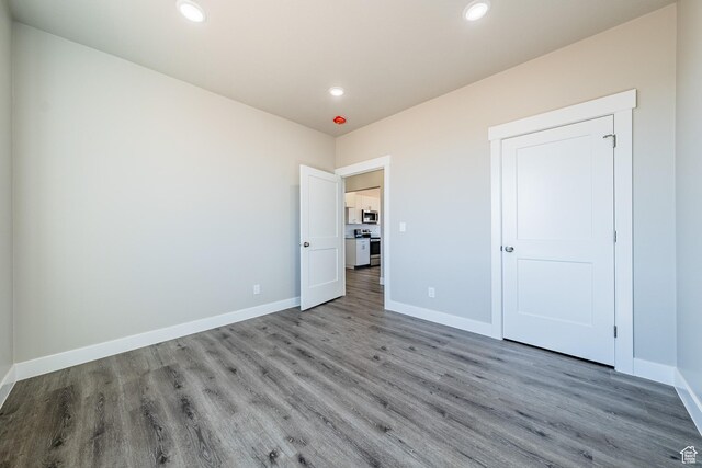 4377 E Colt Cir, Kanab, UT 84741 - unfurnished bedroom featuring recessed lighting, baseboards, and wood finished floors