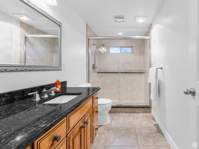 3265 N 1050 W, Pleasant View, UT 84414 - full bathroom featuring visible vents, baseboards, toilet, a stall shower, and vanity