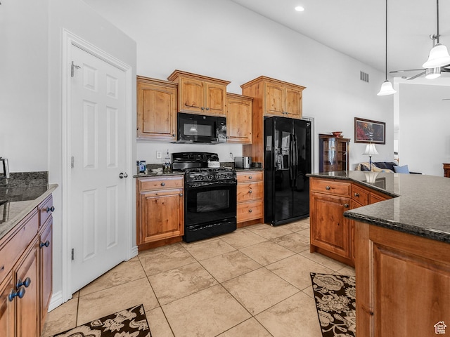 3265 N 1050 W, Pleasant View, UT 84414 - kitchen with visible vents, brown cabinets, black appliances, decorative light fixtures, and light tile patterned floors
