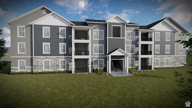 13687 S Hanley Ln Unit Dd102, Riverton, UT 84096 - view of front facade featuring a front lawn, board and batten siding, and stone siding