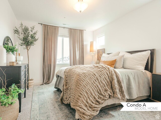 13687 S Hanley Ln Unit Dd102, Riverton, UT 84096 - bedroom with baseboards and visible vents