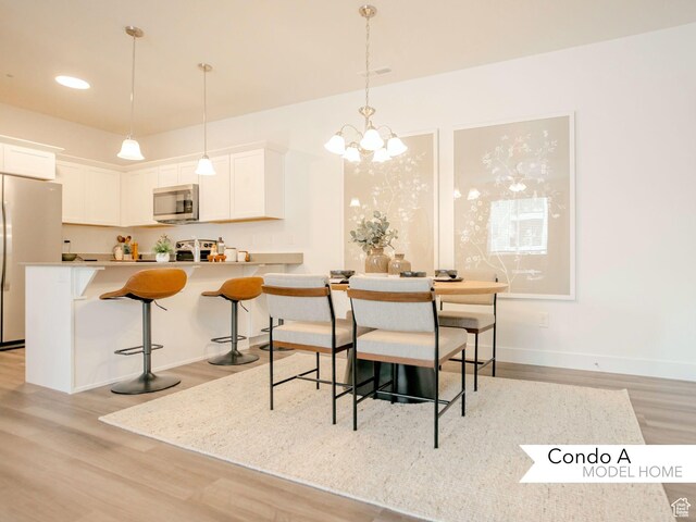13687 S Hanley Ln Unit Dd102, Riverton, UT 84096 - dining room featuring visible vents, recessed lighting, light wood-type flooring, and baseboards