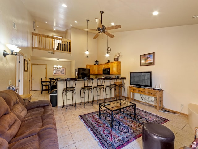 2 Desert Wind Dr Unit 2, Moab, UT 84532 - living area with recessed lighting, light tile patterned flooring, ceiling fan with notable chandelier, and visible vents