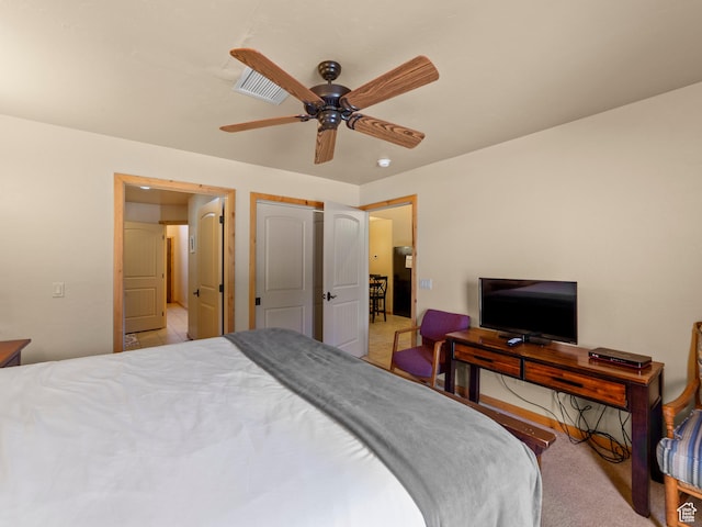 2 Desert Wind Dr Unit 2, Moab, UT 84532 - bedroom with light carpet and a ceiling fan