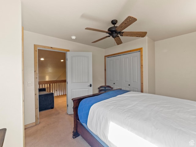 2 Desert Wind Dr Unit 2, Moab, UT 84532 - bedroom with light carpet, ceiling fan, and a closet