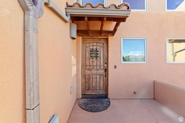 2 Desert Wind Dr Unit 2, Moab, UT 84532 - doorway to property featuring stucco siding