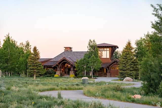 8376 E Aspen Rdg Unit 44, Heber City, UT 84032 - log home with stone siding, a standing seam roof, and a metal roof