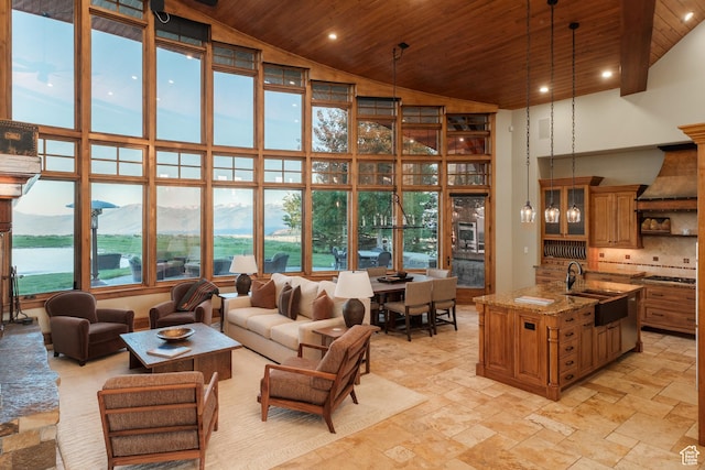 8376 E Aspen Rdg Unit 44, Heber City, UT 84032 - living area with wooden ceiling, high vaulted ceiling, a mountain view, stone tile flooring, and recessed lighting