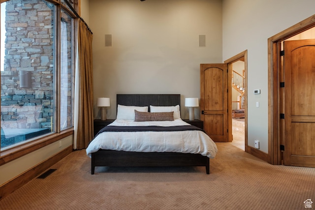 8376 E Aspen Rdg Unit 44, Heber City, UT 84032 - bedroom with light colored carpet and a high ceiling