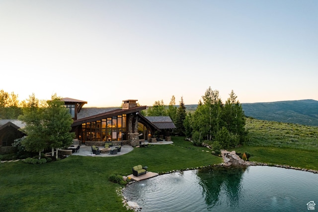 8376 E Aspen Rdg Unit 44, Heber City, UT 84032 - exterior space with a patio area and a lawn