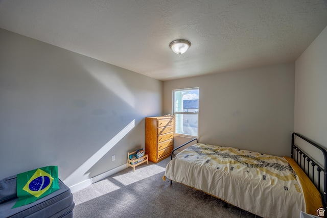 1997 E Abbey Way S, Eagle Mountain, UT 84005 - bedroom featuring baseboards, carpet floors, and a textured ceiling