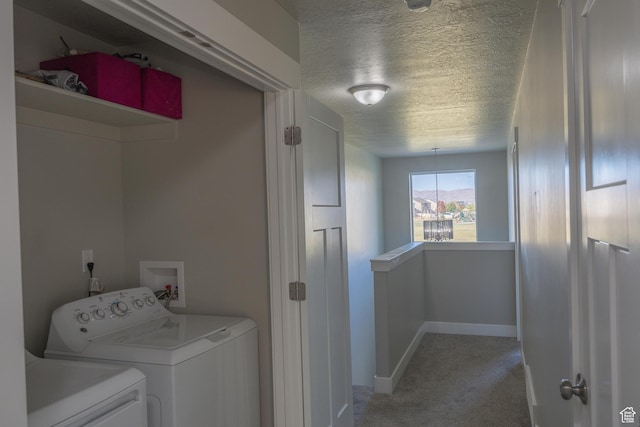 1997 E Abbey Way S, Eagle Mountain, UT 84005 - washroom with baseboards, washing machine and clothes dryer, laundry area, a textured ceiling, and light colored carpet