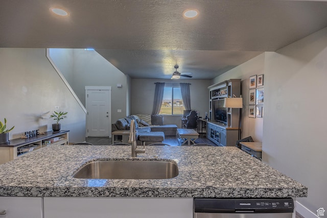 1997 E Abbey Way S, Eagle Mountain, UT 84005 - kitchen with a sink, open floor plan, stone countertops, a ceiling fan, and stainless steel dishwasher