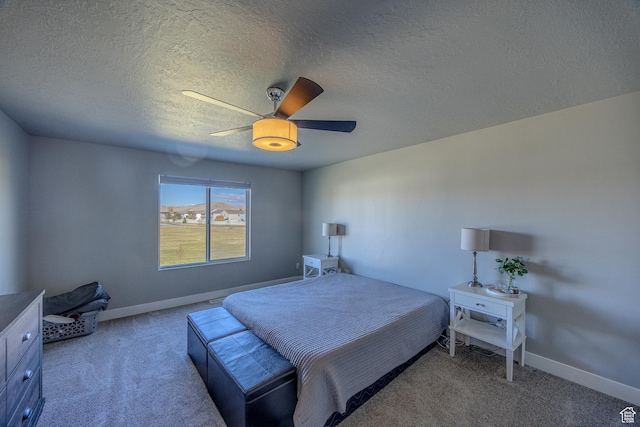 1997 E Abbey Way S, Eagle Mountain, UT 84005 - bedroom featuring a textured ceiling, carpet, baseboards, and ceiling fan