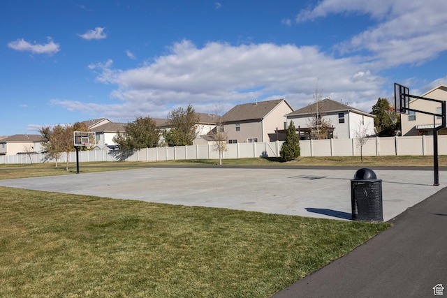 1997 E Abbey Way S, Eagle Mountain, UT 84005 - view of sport court featuring a yard, a residential view, community basketball court, and fence