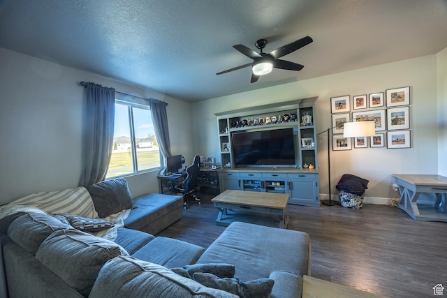 1997 E Abbey Way S, Eagle Mountain, UT 84005 - living area featuring a ceiling fan, baseboards, dark wood-style flooring, and a textured ceiling