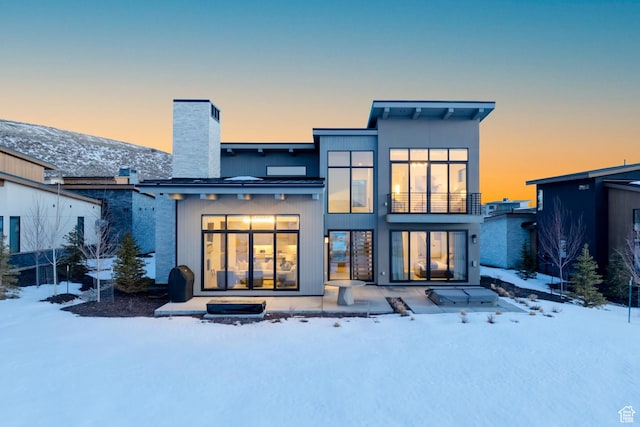 5790 Cobalt Cir, Park City, UT 84098 - snow covered house featuring a chimney