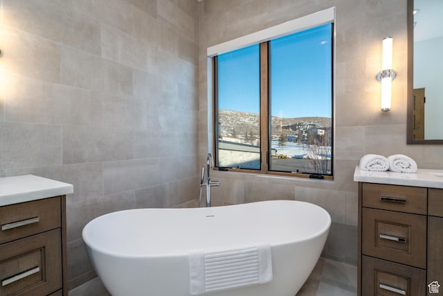 5790 Cobalt Cir, Park City, UT 84098 - full bathroom featuring a freestanding tub, tile walls, and vanity