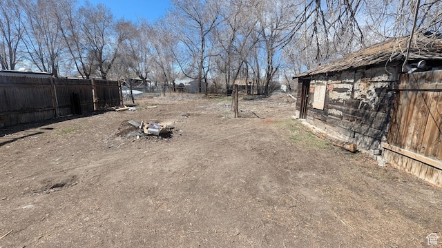view of yard featuring fence