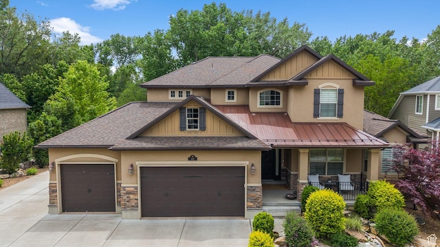 69 W Grove Creek Cir N, Farmington, UT 84025 - craftsman inspired home with stone siding, a porch, stucco siding, an attached garage, and roof with shingles