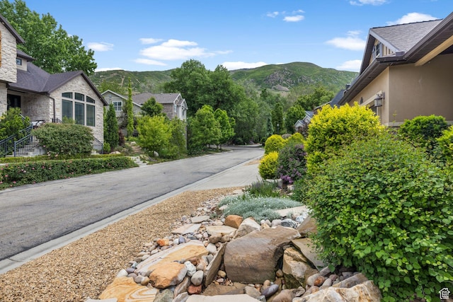 69 W Grove Creek Cir N, Farmington, UT 84025 - view of asphalt street with a mountain view