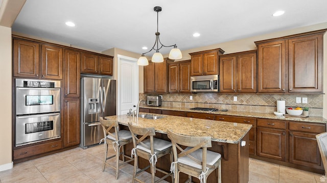 69 W Grove Creek Cir N, Farmington, UT 84025 - kitchen with appliances with stainless steel finishes, a sink, backsplash, light tile patterned floors, and light stone countertops