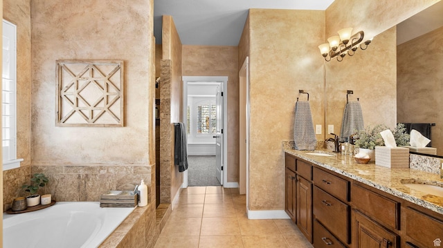 69 W Grove Creek Cir N, Farmington, UT 84025 - full bath featuring tiled tub, tile patterned floors, double vanity, and baseboards
