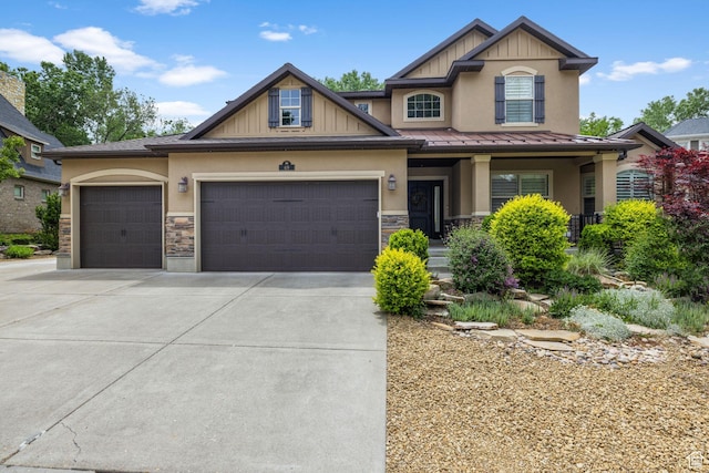 69 W Grove Creek Cir N, Farmington, UT 84025 - craftsman house featuring a garage, stucco siding, concrete driveway, and stone siding
