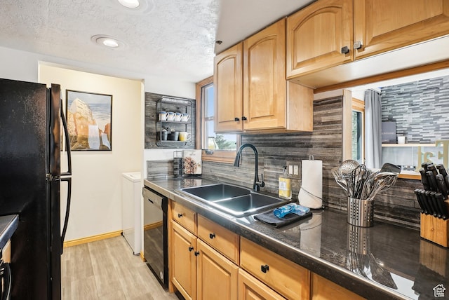 7035 N 2200 W Unit 3O, Park City, UT 84098 - kitchen with a sink, black appliances, a textured ceiling, dark countertops, and tasteful backsplash