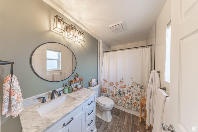 2350 N 720 W, Layton, UT 84041 - full bath featuring a shower with shower curtain, wood finished floors, toilet, and vanity