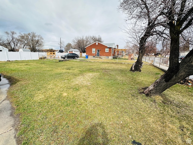 view of yard with fence