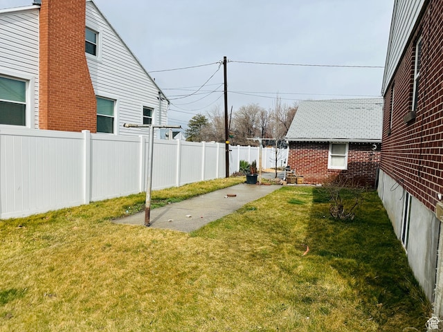 view of yard with fence