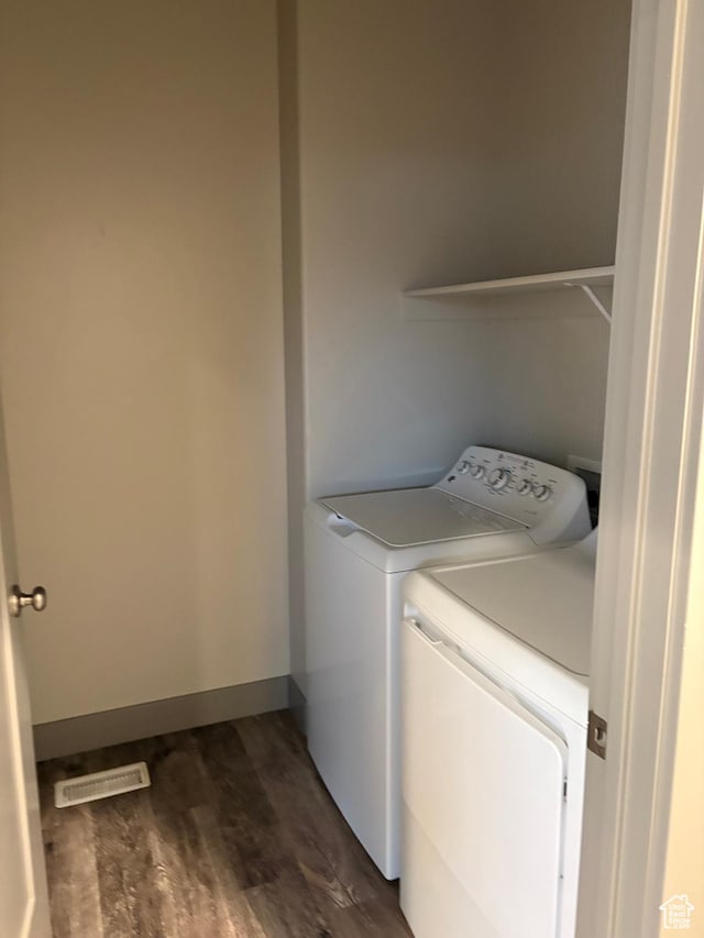 12734 S 1630 W, Riverton, UT 84065 - laundry area with dark wood-type flooring, laundry area, visible vents, and washer and clothes dryer
