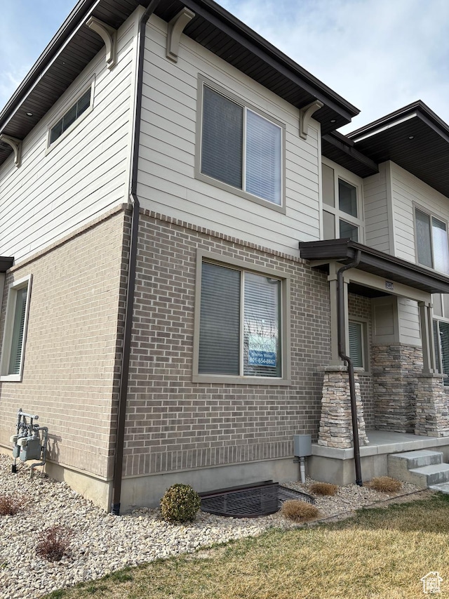 12734 S 1630 W, Riverton, UT 84065 - view of property exterior featuring brick siding