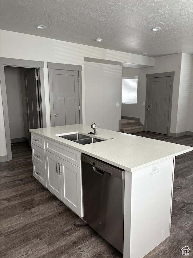 12734 S 1630 W, Riverton, UT 84065 - kitchen with white cabinets, a sink, an island with sink, a textured ceiling, and stainless steel dishwasher