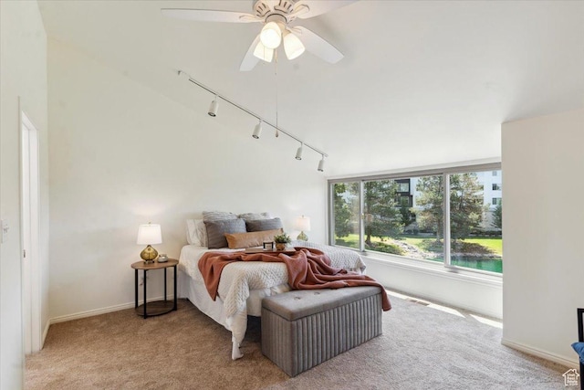1231 E Brickyard Rd Unit 505, Millcreek, UT 84106 - bedroom with rail lighting, light carpet, and a ceiling fan