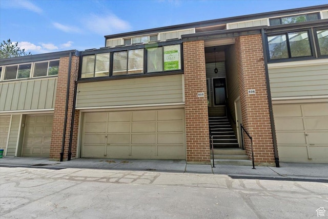 1231 E Brickyard Rd Unit 505, Millcreek, UT 84106 - multi unit property featuring brick siding and a garage