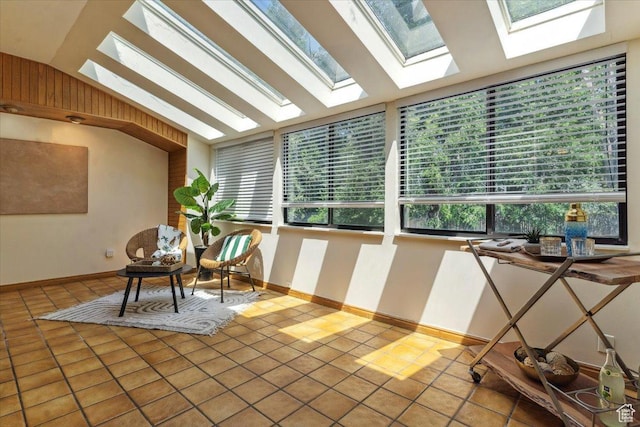 1231 E Brickyard Rd Unit 505, Millcreek, UT 84106 - sunroom with a skylight, tile patterned flooring, and vaulted ceiling