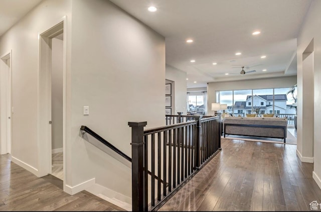 6211 W Wapiti Ridge Ln Unit 332, Herriman, UT 84096 - hall with recessed lighting, baseboards, an upstairs landing, and wood-type flooring