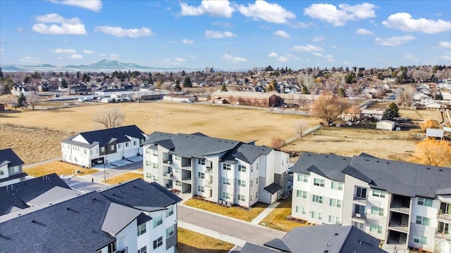 birds eye view of property featuring a mountain view and a residential view