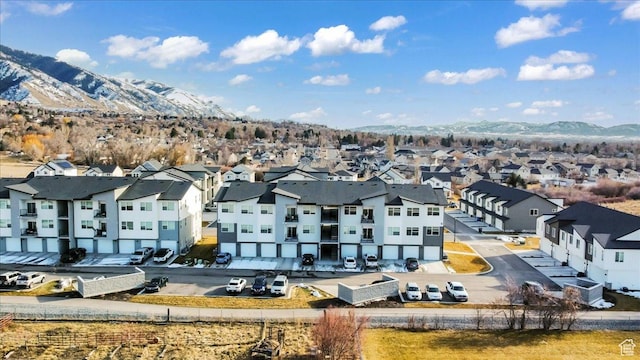 bird's eye view featuring a mountain view and a residential view
