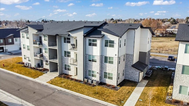 view of building exterior with a residential view