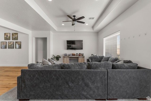 1639 E Yant Flant Dr, St George, UT 84790 - living area featuring a raised ceiling, a ceiling fan, wood finished floors, recessed lighting, and baseboards