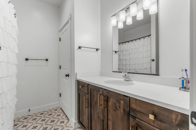 1639 E Yant Flant Dr, St George, UT 84790 - bathroom with tile patterned floors, vanity, and baseboards