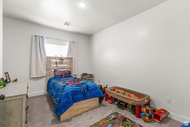 1639 E Yant Flant Dr, St George, UT 84790 - bedroom with baseboards, visible vents, carpet floors, and a textured ceiling