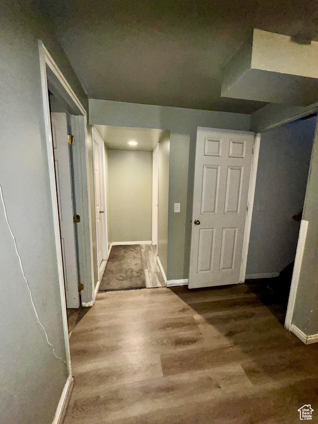 173 W Dimaggio Dr N, Tooele, UT 84074 - hall with baseboards and wood finished floors