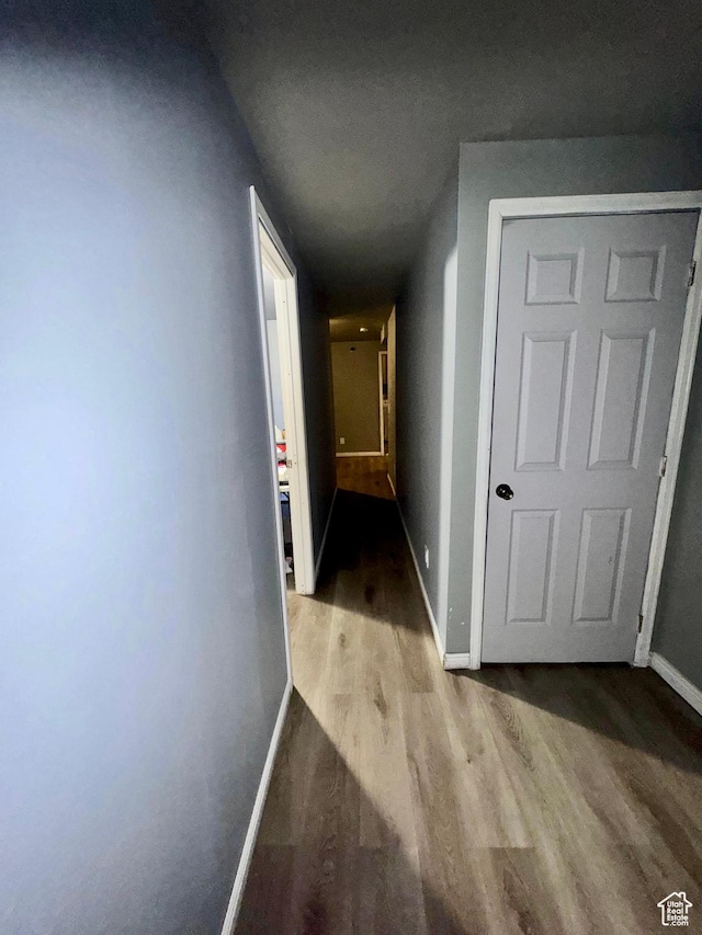 173 W Dimaggio Dr N, Tooele, UT 84074 - hallway featuring wood finished floors and baseboards
