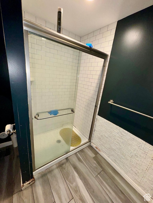 173 W Dimaggio Dr N, Tooele, UT 84074 - full bath featuring a shower stall and wood finished floors