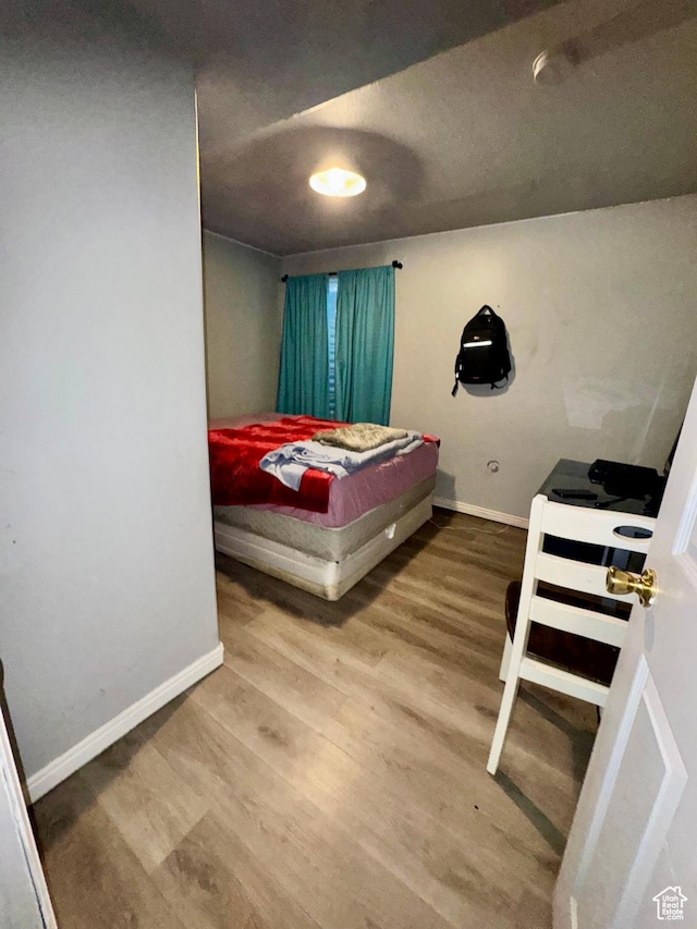 173 W Dimaggio Dr N, Tooele, UT 84074 - bedroom with baseboards and wood finished floors